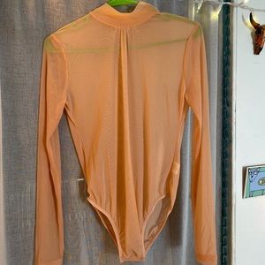 Womens sheer blush long sleeved bodysuit size large- never worn!
